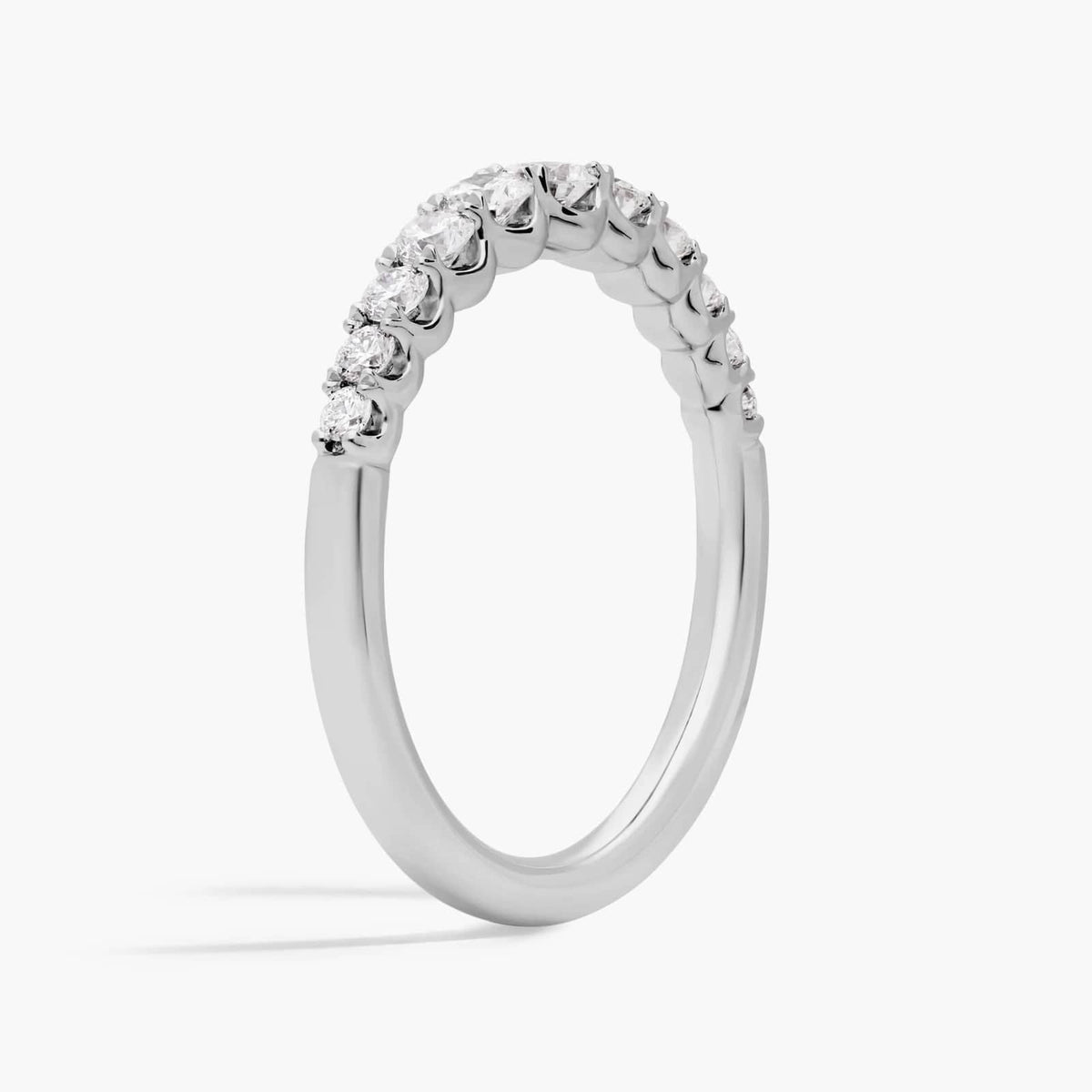 Women's sterling silver wedding band with pear-cut moissanite in a prong setting 