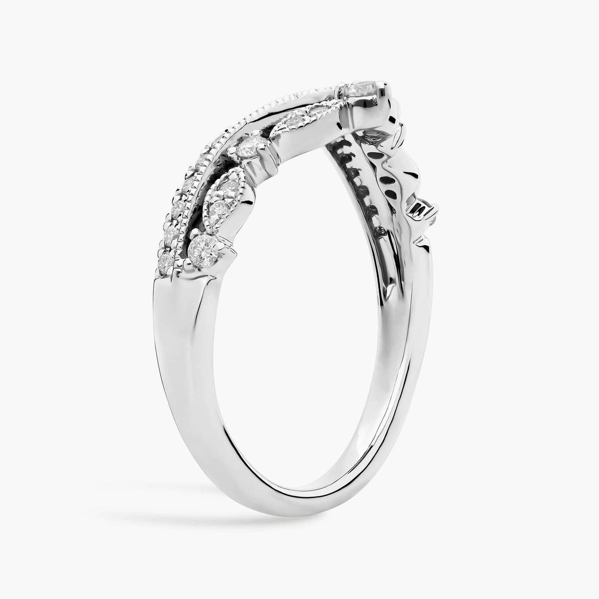 Sterling silver moissanite wedding ring with V-shaped chevron band and pavé setting