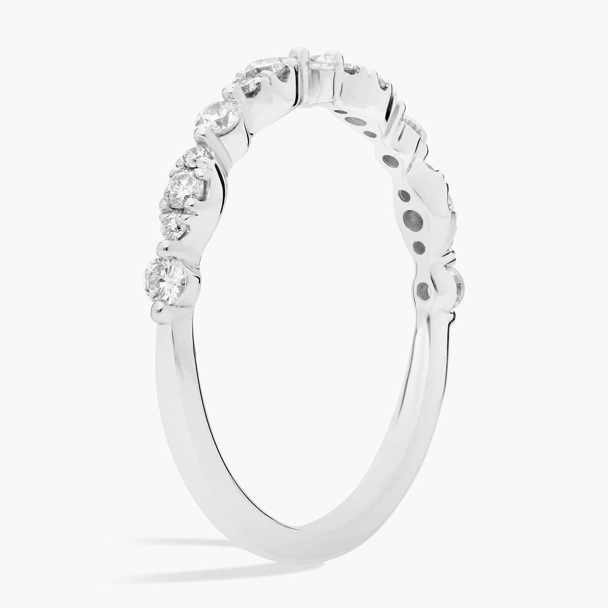 1.6 mm silver-tone wedding band with round-cut moissanite, shown from the side