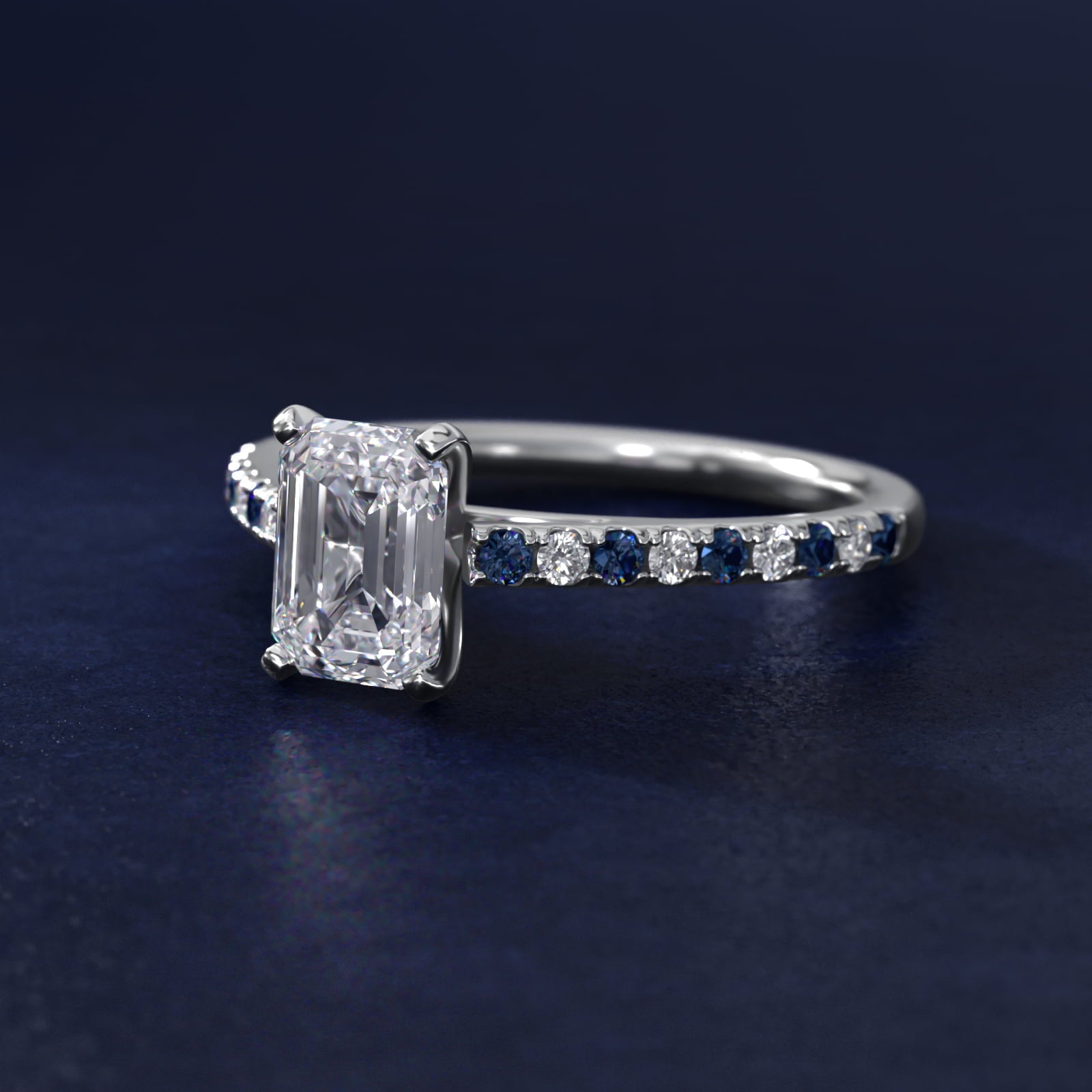 Sterling Silver Emerald Cut Moissanite Engagement Ring Riviera Micropavé with Lab Grown Sapphire and Moissanite Sidestone (2.0 ct., 1/10 ct. tw.) Secondary image