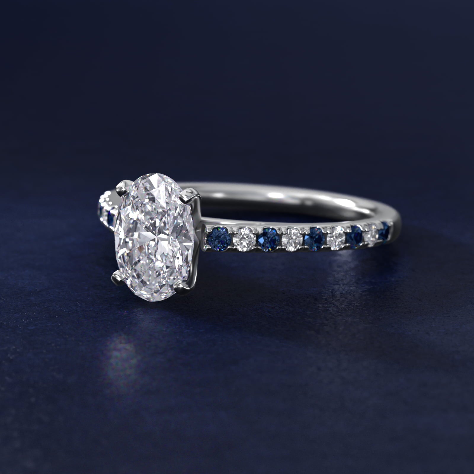 Sterling Silver Oval Cut Moissanite Engagement Ring Riviera Micropavé with Lab Grown Sapphire and Moissanite Sidestone (2.0 ct., 1/10 ct. tw.) Secondary image
