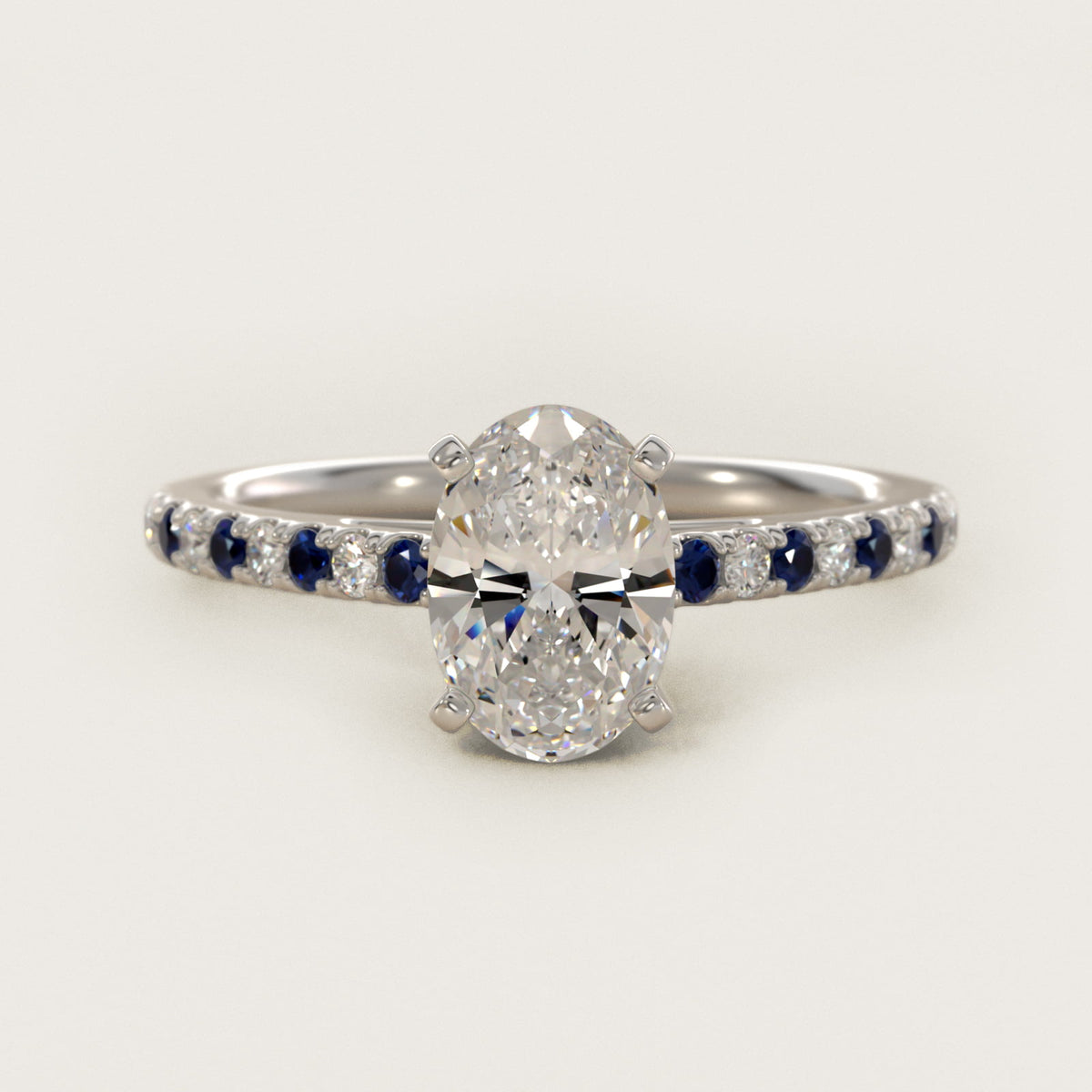 Sterling Silver Oval Cut Moissanite Engagement Ring Riviera Micropavé with Lab Grown Sapphire and Moissanite Sidestone (2.0 ct., 1/10 ct. tw.) Main image