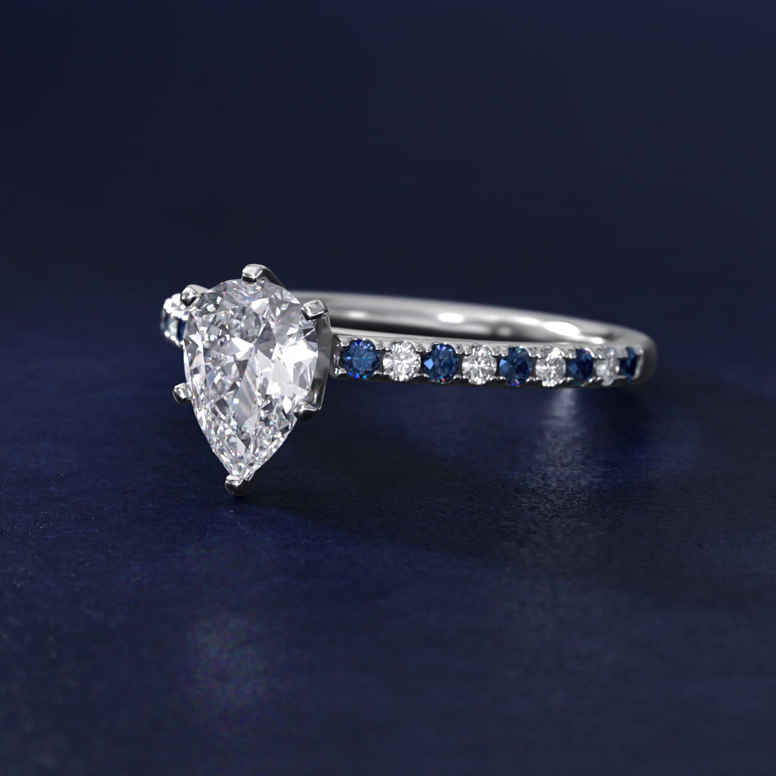 Sterling Silver Pear Cut Moissanite Engagement Ring Riviera Micropavé with Lab Grown Sapphire and Moissanite Sidestone (2.0 ct., 1/10 ct. tw.) Secondary image
