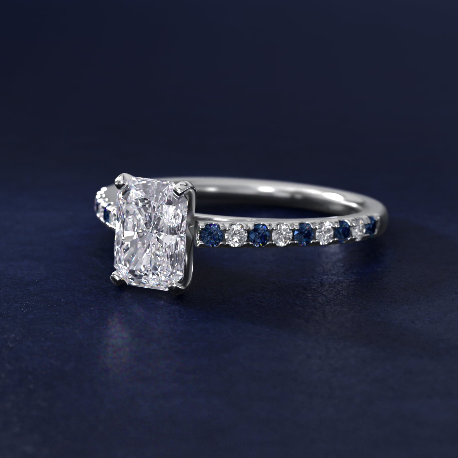 Sterling Silver Radiant Cut Moissanite Engagement Ring Riviera Micropavé with Lab Grown Sapphire and Moissanite Sidestone (2.0 ct., 1/10 ct. tw.) Secondary image