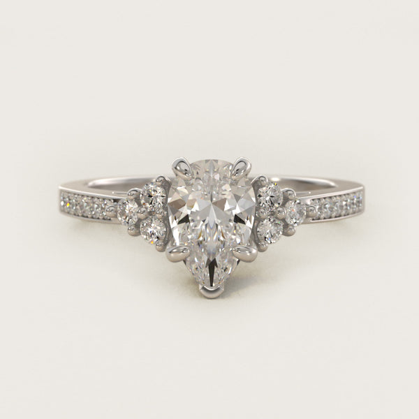 Sterling Silver Pear Cut Moissanite Engagement Ring Pavé Trio Side Stone (2.0 ct., 1/4 ct. tw.)