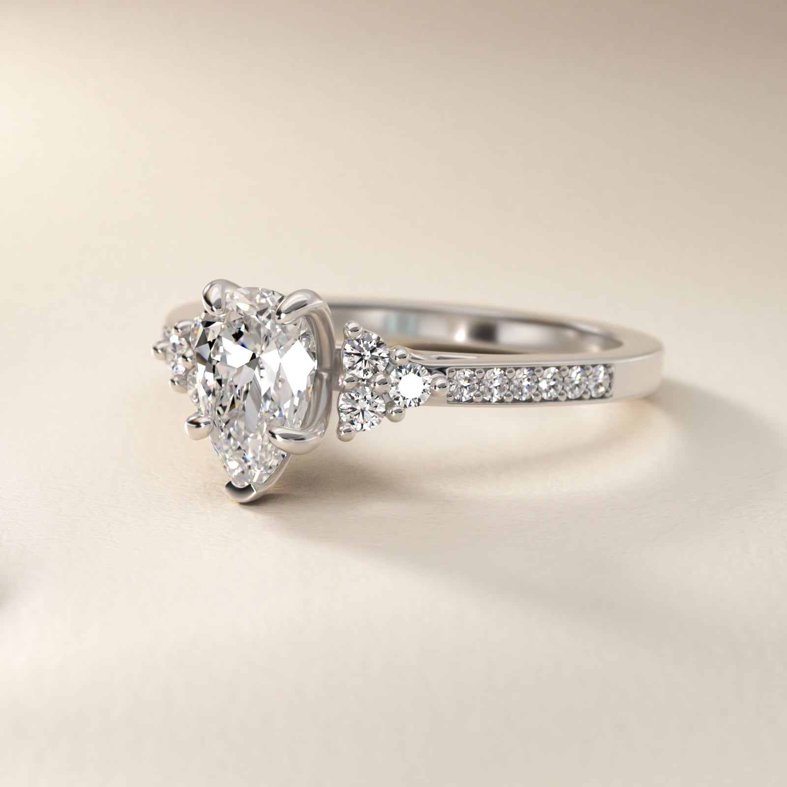 Sterling Silver Pear Cut Moissanite Engagement Ring Pavé Trio Side Stone (2.0 ct., 1/4 ct. tw.) Secondary image